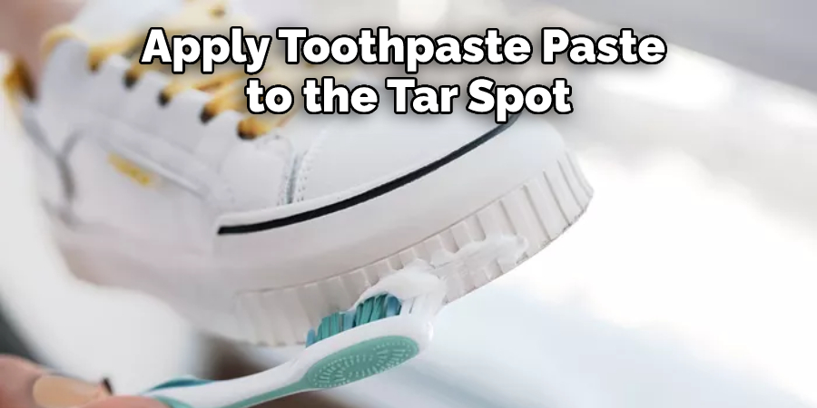 Apply Toothpaste Paste  to the Tar Spot