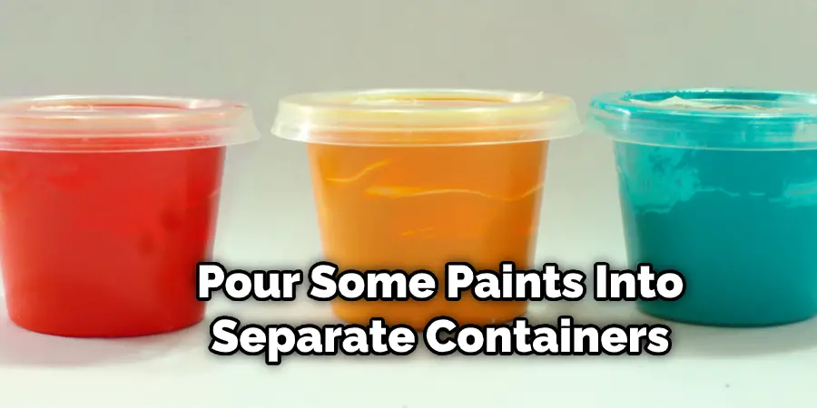 Pour Some Paints Into Separate Containers