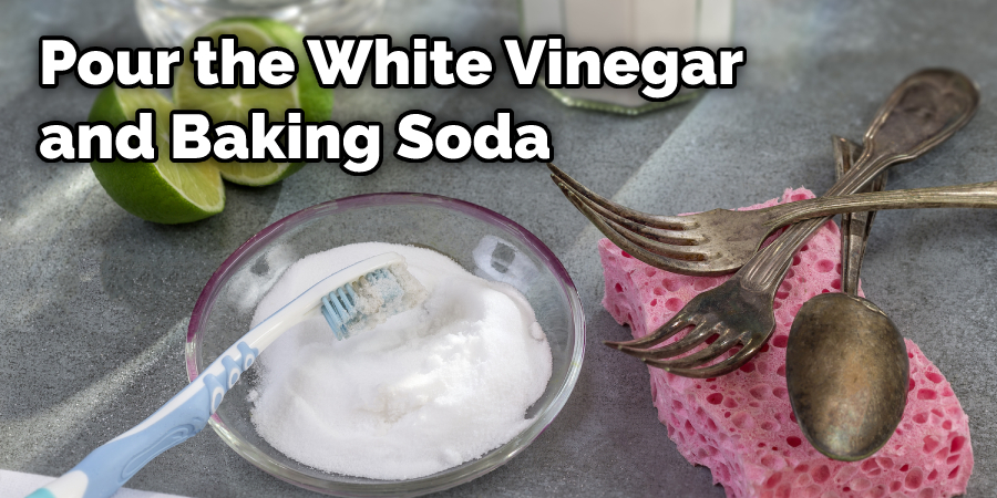 Pour the White Vinegar and Baking Soda