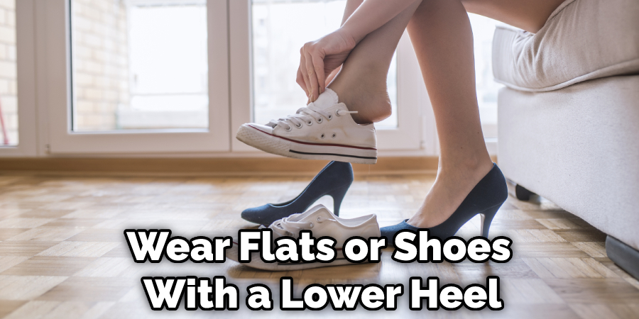 Wear Flats or Shoes With a Lower Heel