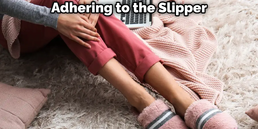 Adhering to the Slipper
