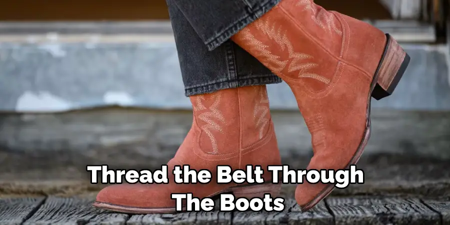Thread the Belt Through  The Boots