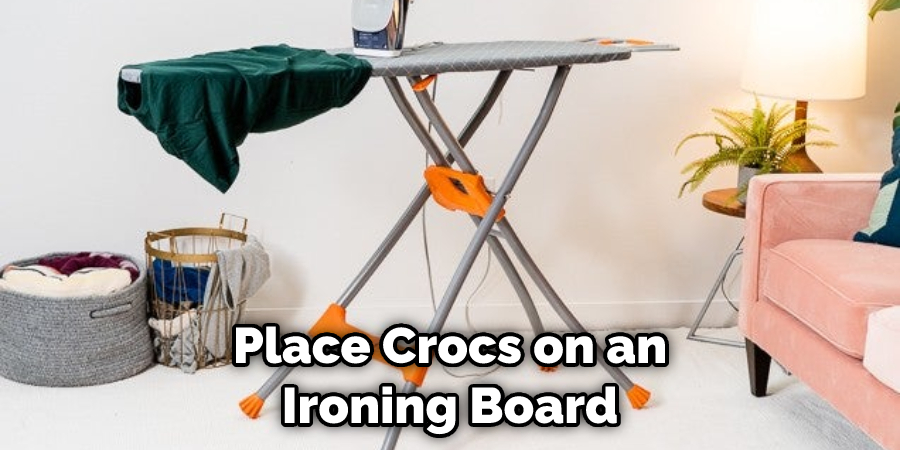 Place Crocs on an Ironing Board