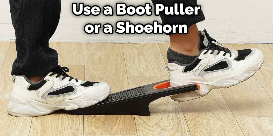 Use a Boot Puller or a Shoehorn