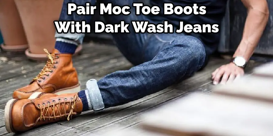 Pair Moc Toe Boots With Dark Wash Jeans