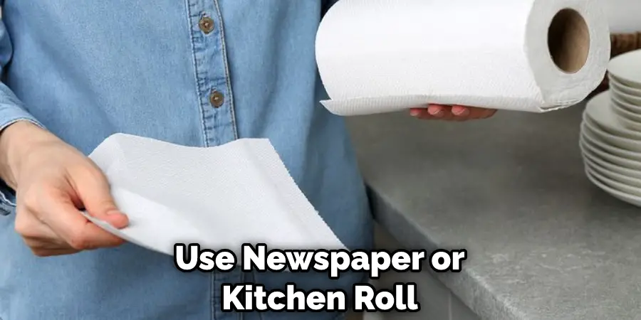 Use Newspaper or Kitchen Roll