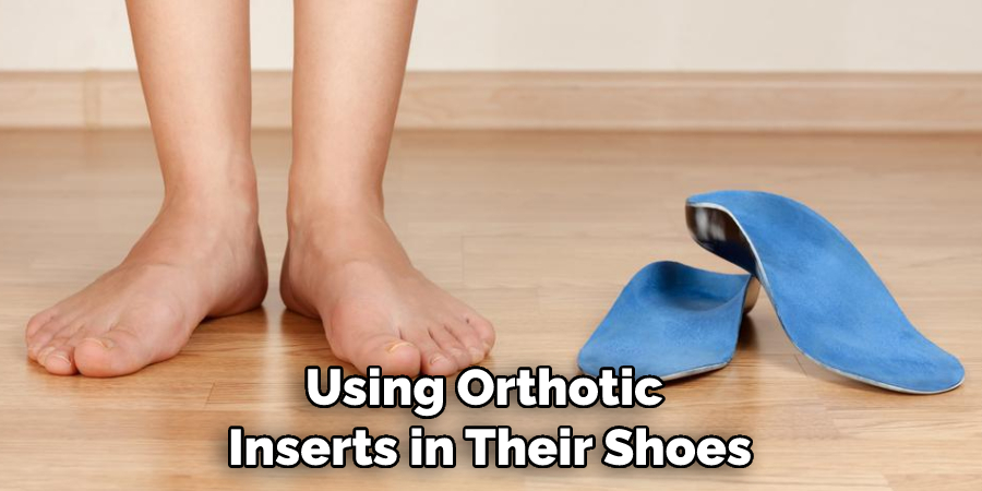 Using Orthotic Inserts in Their Shoes