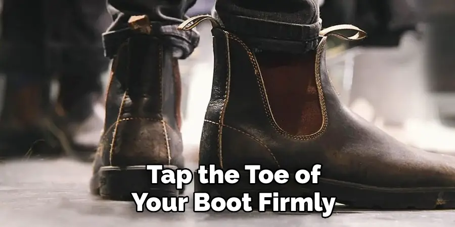 Tap the Toe of 
Your Boot Firmly