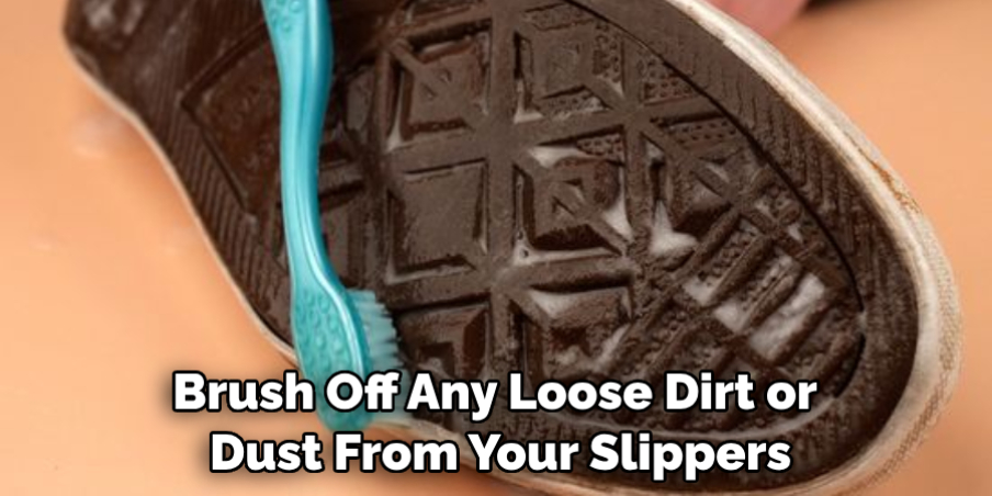 Brush Off Any Loose Dirt or Dust From Your Slippers