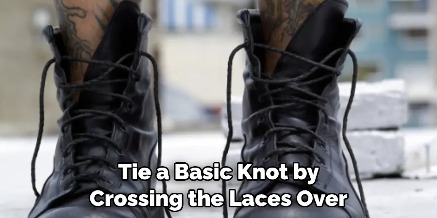 Tie a Basic Knot by Crossing the Laces Over