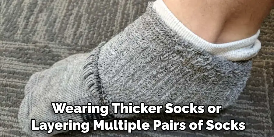 Wearing Thicker Socks or Layering Multiple Pairs of Socks