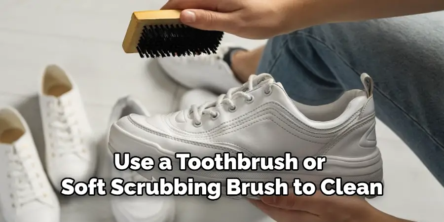 Use a Toothbrush or Soft Scrubbing Brush to Clean