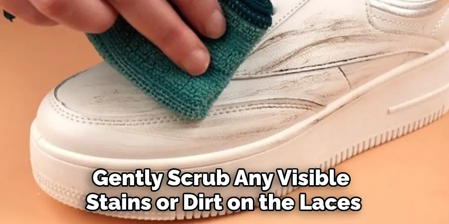 Gently Scrub Any Visible 
Stains or Dirt on the Laces