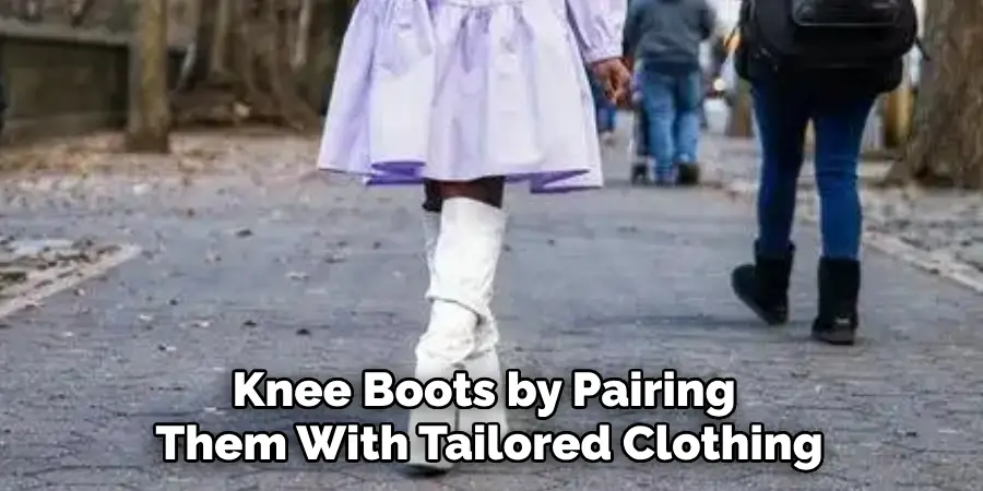 Knee Boots by Pairing 
Them With Tailored Clothing