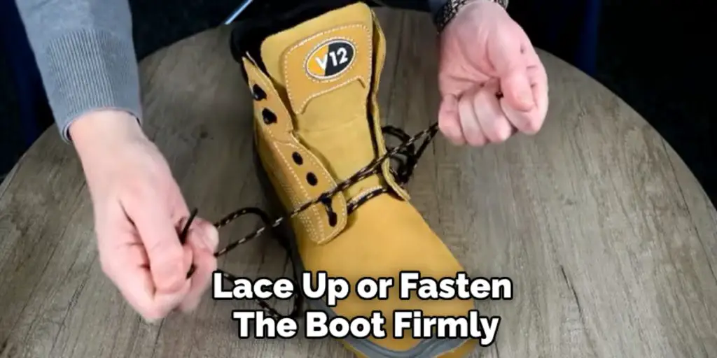 Lace Up or Fasten 
The Boot Firmly